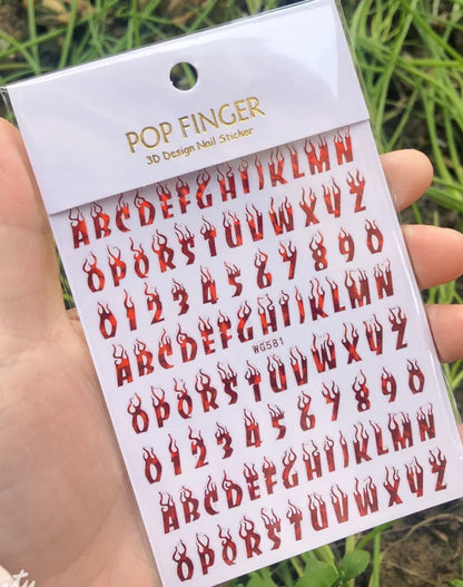 Black Old English font nail art stickers featuring alphabet letter transfers for gothic and gothic nail decoration by Blushimmer.