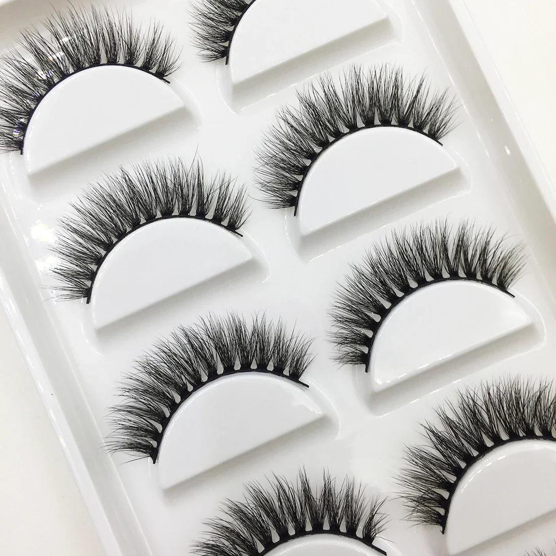 Set of 5 pairs of natural 3D Mink false eyelashes by Blushimmer, perfect for makeup and beauty enhancements.