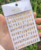 Black Gothic alphabet nail art stickers with Old English font, perfect for decorative nail designs and goth style manicures.