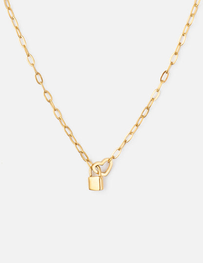 Elevated Faith heart lock paperclip chain necklace featuring a delicate heart-shaped lock pendant on a sleek chain.