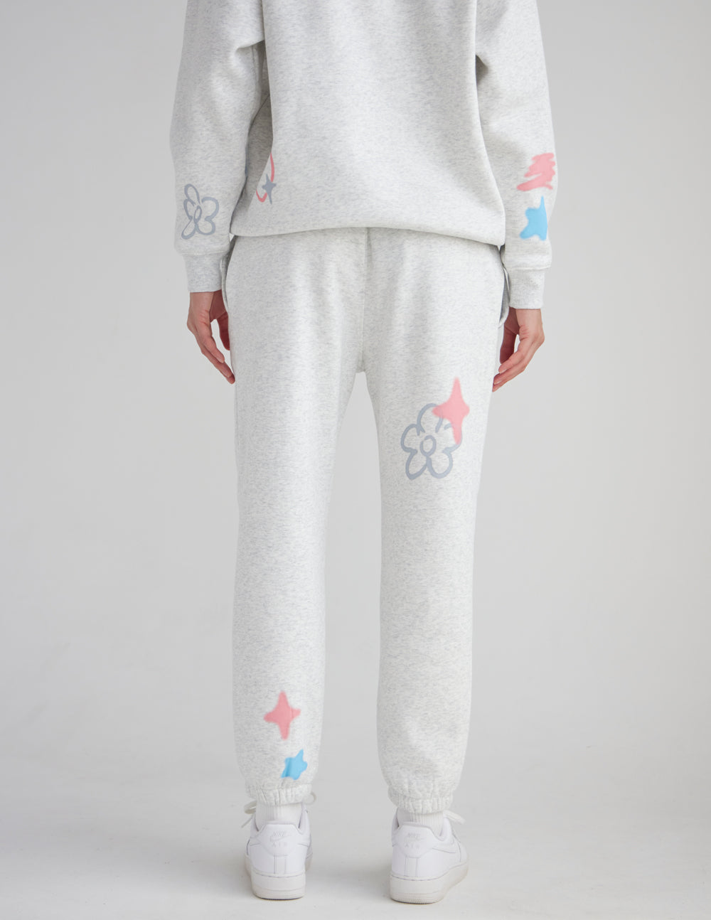 Unisex Heaven Is Real sweatpant by Elevated Faith, featuring a comfortable fit and graphic design, in a casual indoor setting.
