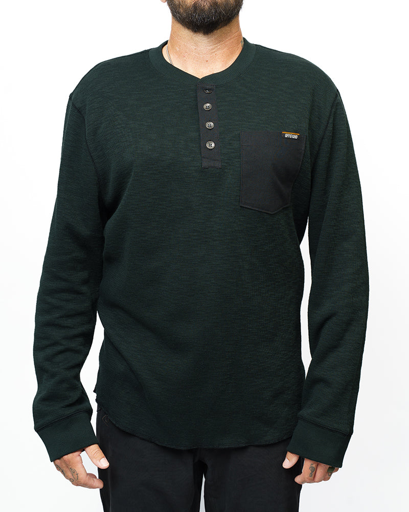 Long sleeve black Henley shirt from Off The Grid Surplus's Draper Henley Vintage Black collection, shown with button details and fabric texture.