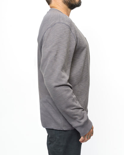 Off The Grid Surplus Draper Henley long-sleeve shirt in Castlerock color, featuring a classic henley neckline and casual fit.