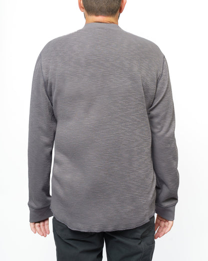 Off The Grid Surplus Draper Henley long-sleeve shirt in Castlerock color, showcasing the casual, comfortable design with button placket.