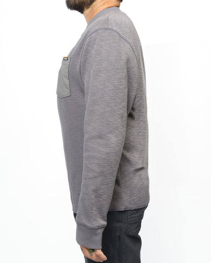 Long-sleeve Draper Henley shirt in Castlerock color by Off The Grid Surplus, featuring a classic Henley neckline and casual fit.