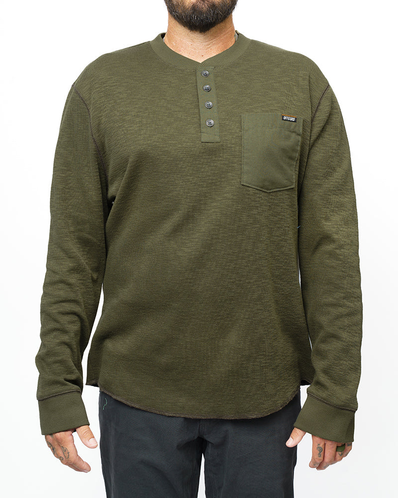 Dark olive Draper Henley long sleeve shirt by Off The Grid Surplus, shown in a close-up view highlighting fabric and fit.