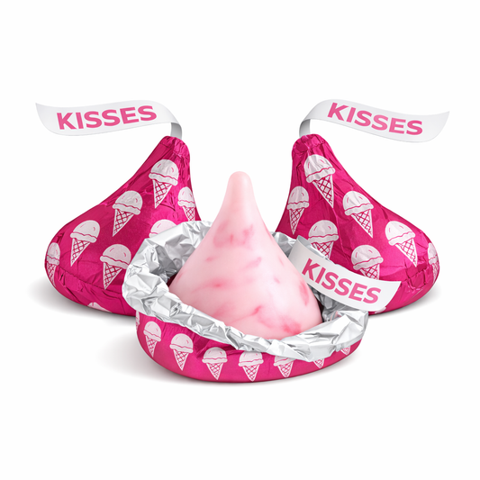 Hershey's Kisses strawberry ice cream cone flavored chocolates in a bulk Candy In Bulk bag, showcasing individually wrapped candies.