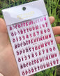 Black Gothic nail art stickers featuring Old English font letters by Blushimmer, perfect for decorative nail designs.
