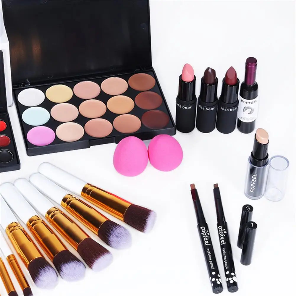 Blushimmer all-in-one makeup kit with lip gloss, eyeshadow, concealer, and brushes in a portable set for women and girls.
