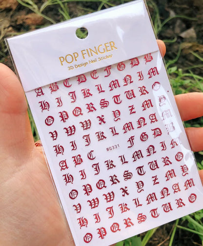 Black Old English font nail art stickers with alphabet letters, gothic style, for decorative nail transfers by Blushimmer.