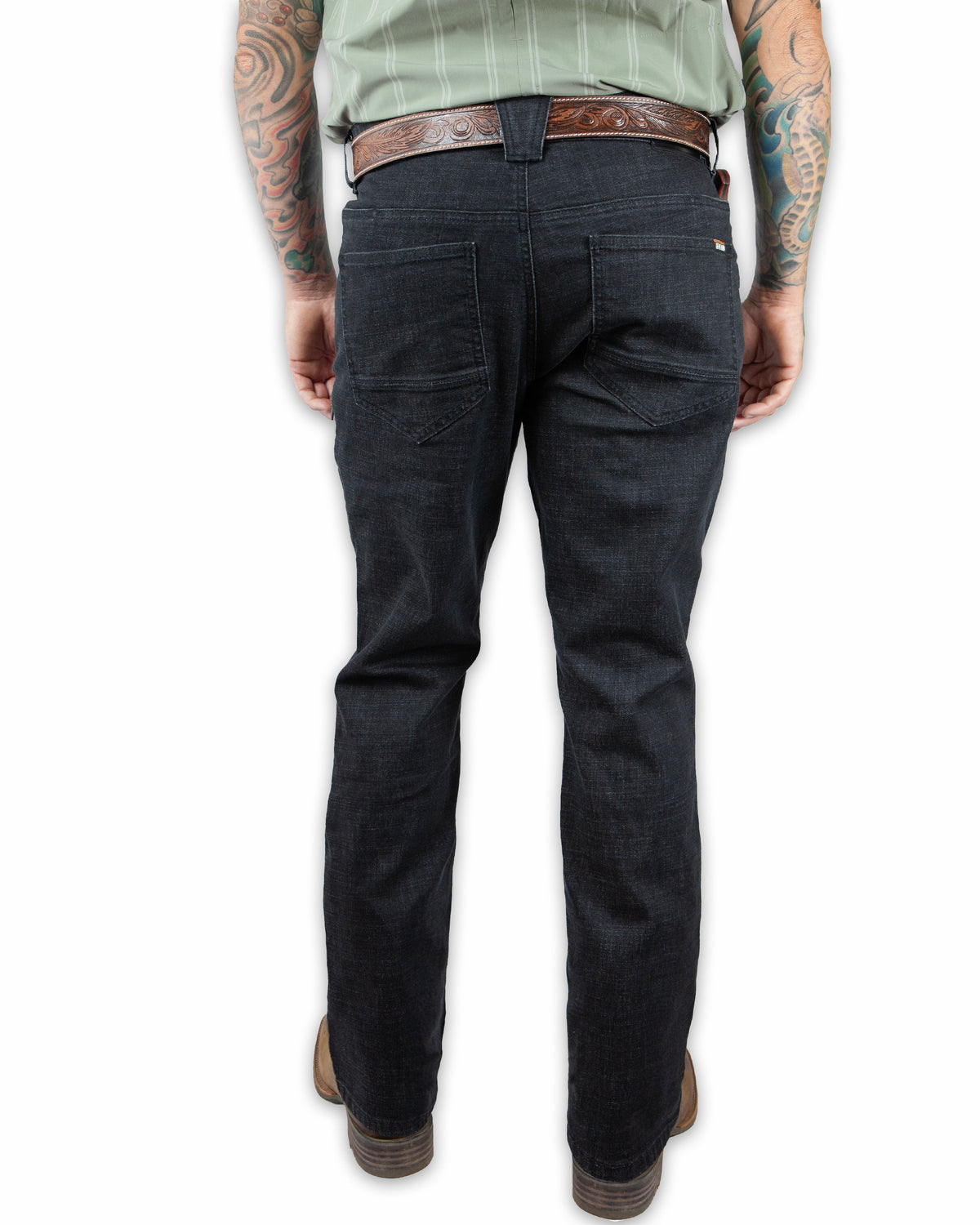 Black denim boot cut pants from Off The Grid Surplus's Hideout collection, featuring classic stitching and a relaxed fit.