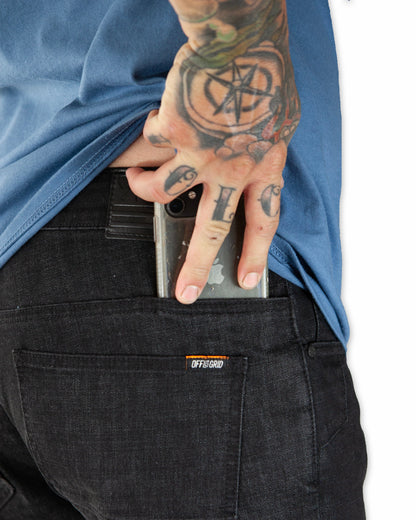 Black Hideout Denim Taper Fit Pants by Off The Grid Surplus, featuring a slim taper design and classic denim texture.