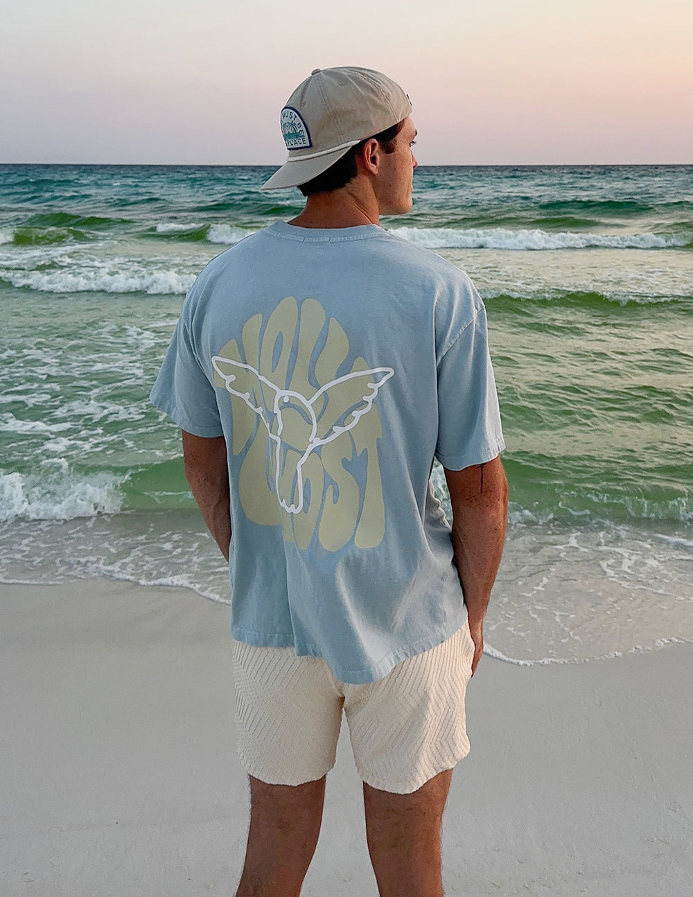 Black Holy Ghost Heavyweight T-shirt by Elevated Faith featuring a bold graphic design on the front.