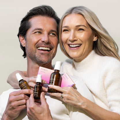 Foria Honeymoon Set with intimate massage oils and sensual accessories, displayed on a cozy, inviting lifestyle setting.