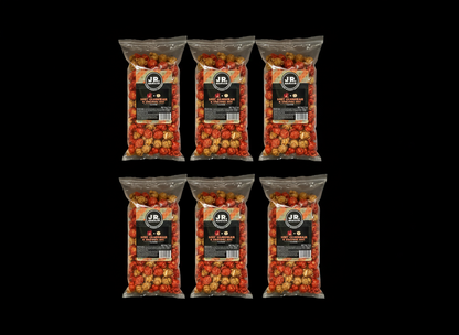 Junior Snacks Company Hot Cheddar and Caramel Mix 6-pack, colorful snack packaging with cheesy and sweet treats visible.