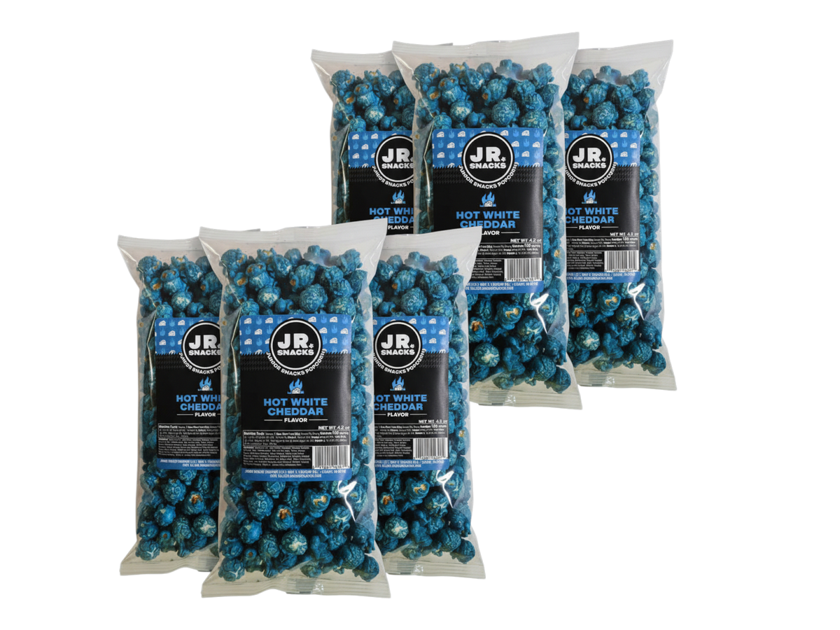 Six-pack of Junior Snacks Co. Hot White Cheddar flavored snacks in colorful packaging, ideal for kids' snacking.