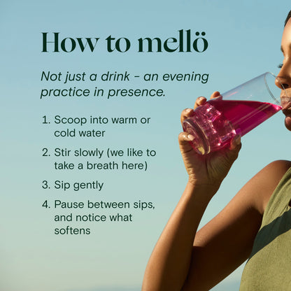 Foria Mellö Magnesium travel sticks, showing a hand holding a stick next to a glass of water for easy use and hydration.