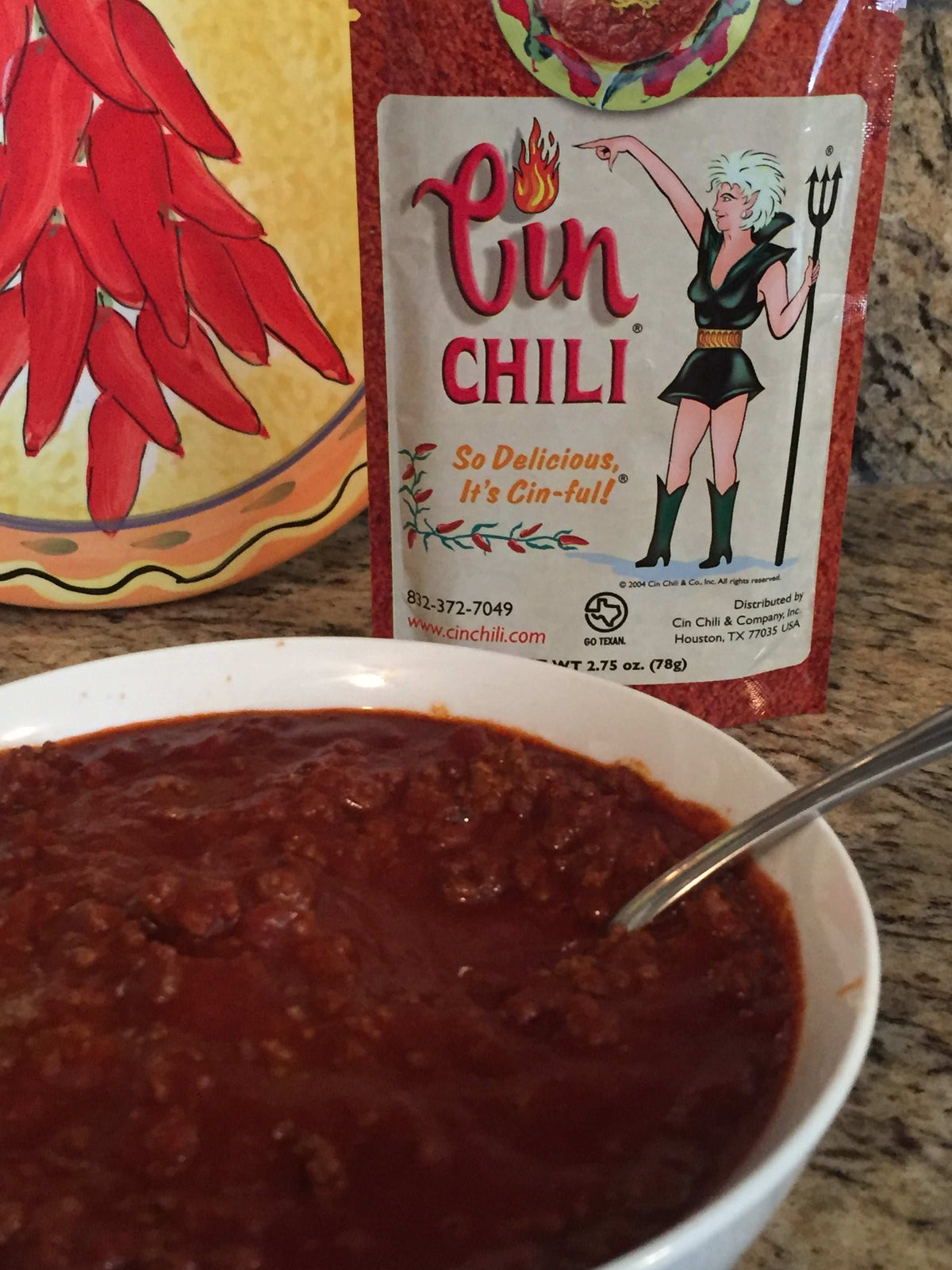 Cinderosa Ranch Cin Chili Seasoning Mix packet, dry spice blend with chili peppers and herbs for flavorful chili dishes.