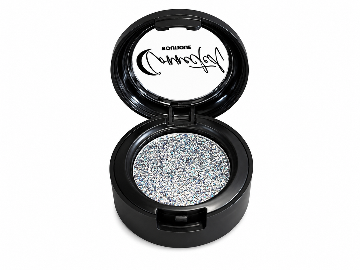 Connected Boutique Grand Central Glam duo-chrome glitter eyeshadow single in a sleek compact with shimmering multi-color finish.