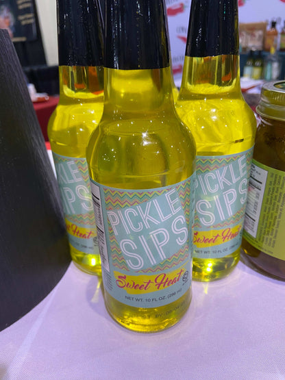 Cinderosa Ranch Pickle Sips Sweet Heat 10 fl oz bottle featuring spicy and sweet pickle-flavored beverage in clear container