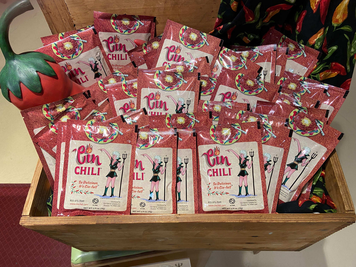 Cinderosa Ranch CIN CHILI SEASONING MIX 24-pack case, close-up of spice mix in colorful packaging.