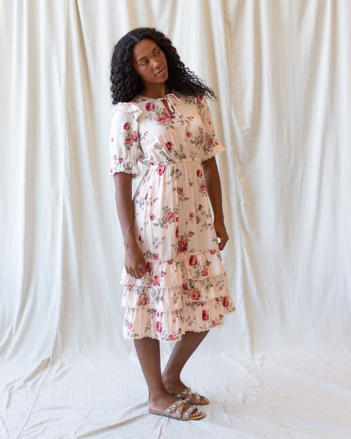 Vintage Romance dress by Downeast, featuring a flowy fabric and lace details, perfect for romantic occasions.