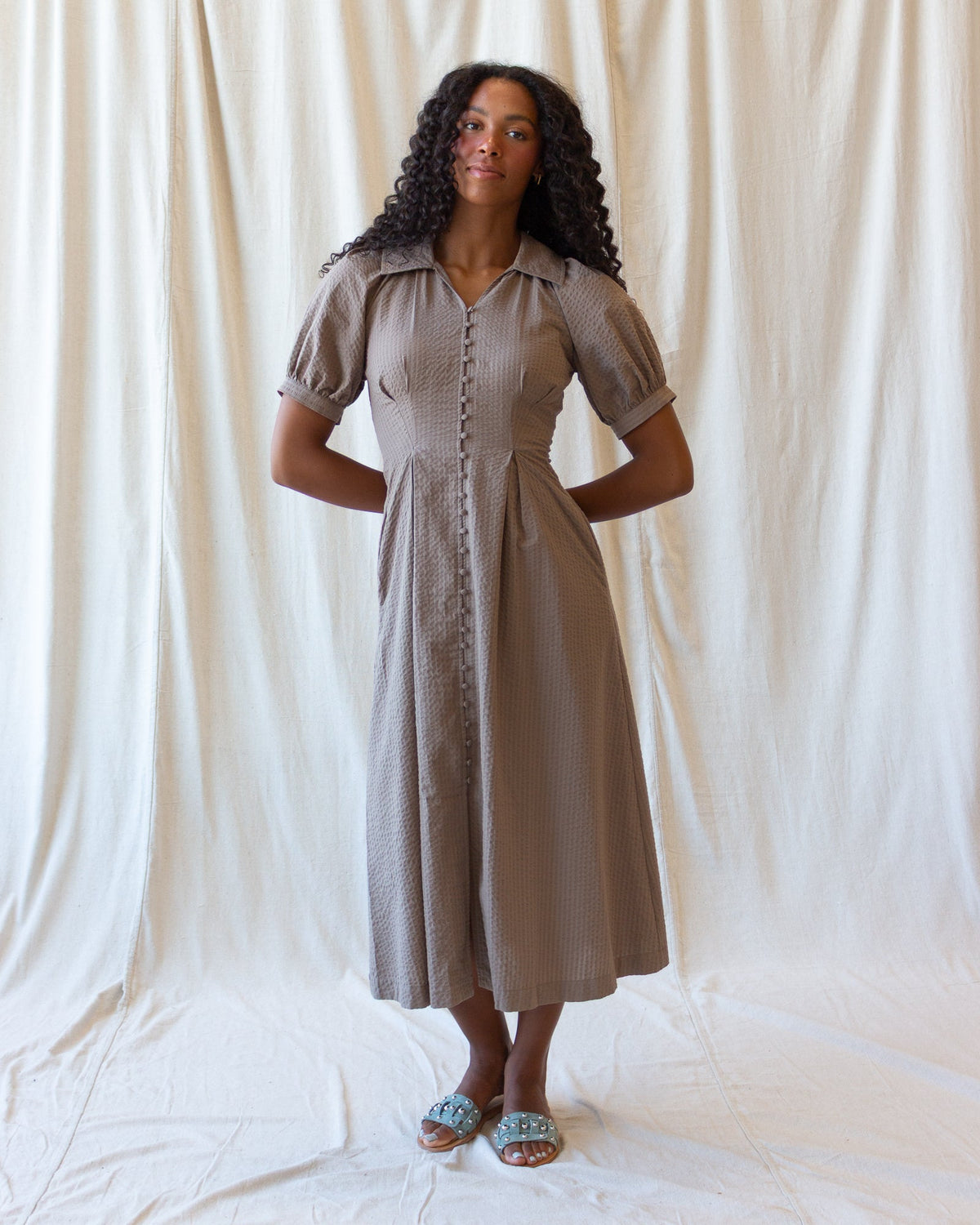 Downeast Femme Field Dress shown in natural fabric with a relaxed fit and floral pattern, perfect for casual wear.