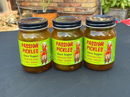 Cinderosa Ranch Passion Pickles® Ghost Pepper Homestyle Chips in a jar with slices of spicy pickles and ghost peppers.