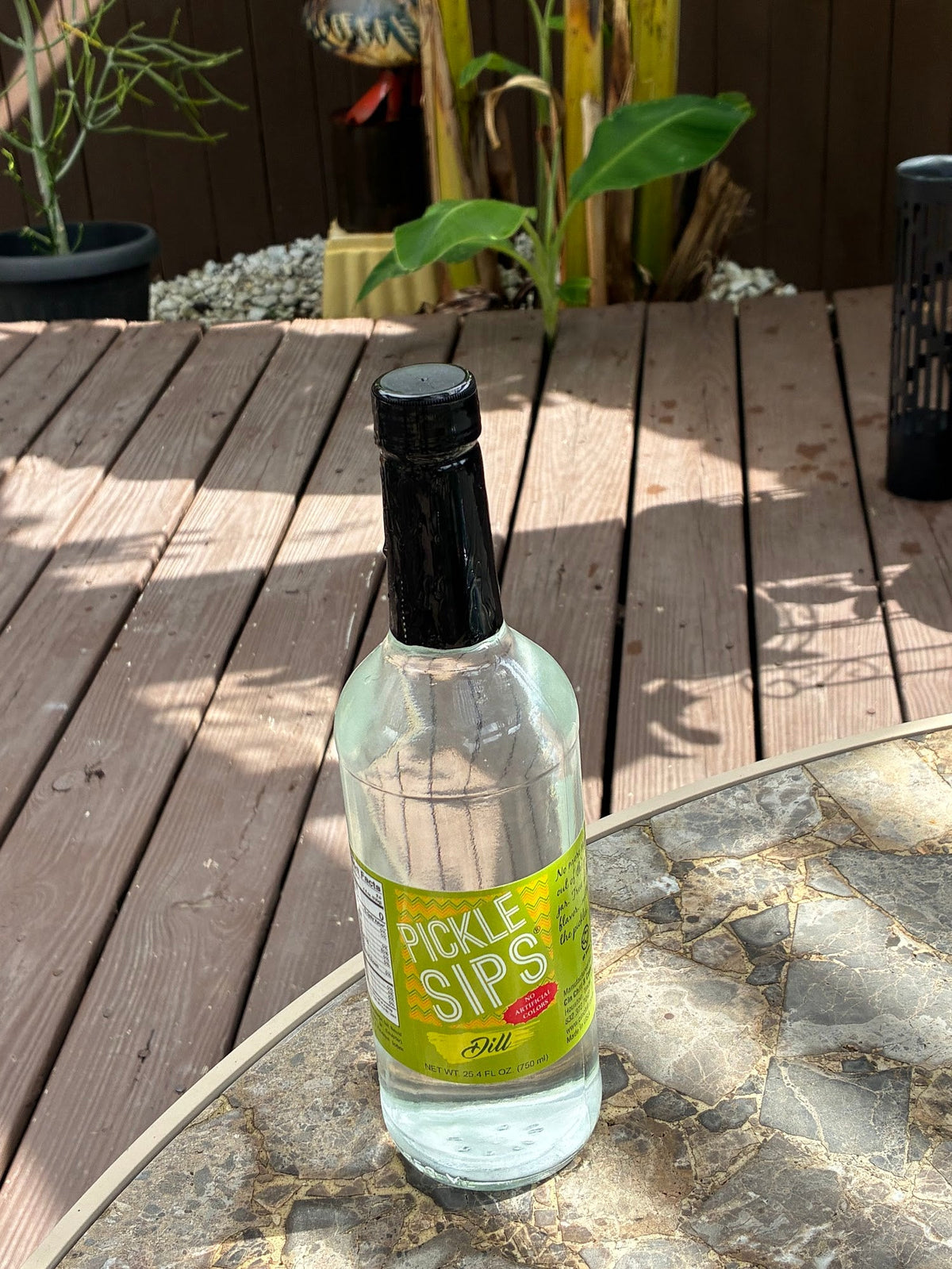 Cinderosa Ranch Pickle Sips Dill flavored pickle juice in 25.4 fl oz bottle on a white background