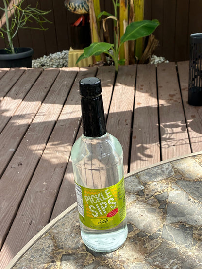 Cinderosa Ranch Pickle Sips Dill flavored pickle juice in 25.4 fl oz bottle on a white background