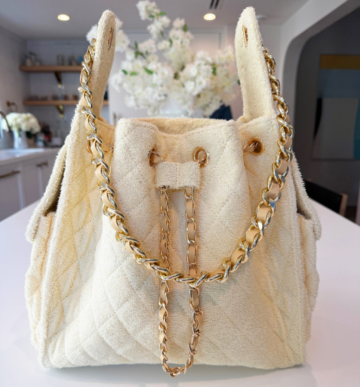 Medium Bayshore Bucket Bag from BEACH HAUS in butter yellow with woven handles and stylish design.
