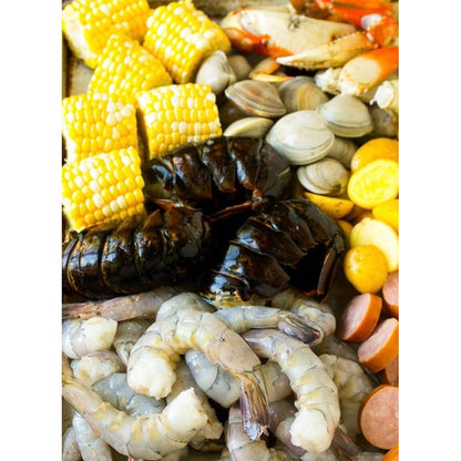 Spicy seafood sauce by 1 Spicy Mama, a flavorful seasoning with herbs and spices for seafood dishes.