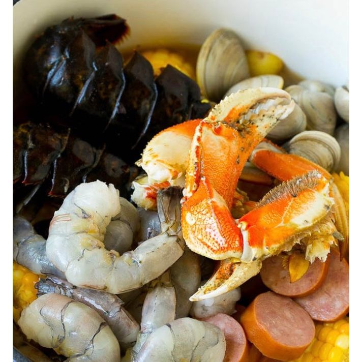 Spicy Mama seafood sauce jar showing vibrant label, perfect for enhancing seafood dishes with bold, savory flavor.