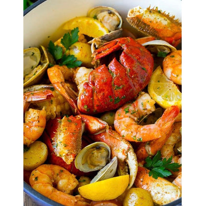 Spicy Mama seafood sauce in a jar, showcasing rich, flavorful seasoning with herbs and spices for seafood dishes.