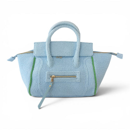 Powder blue BEACH HAUS Cabana Tote Mini with woven handles and spacious interior for beach or casual use.