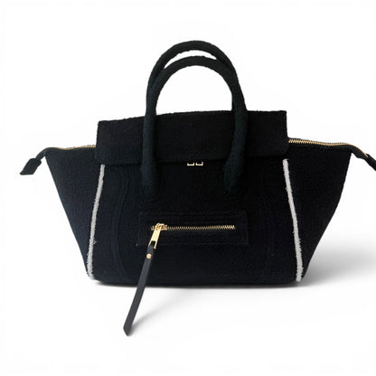 Black Cabana Tote Mini by BEACH HAUS featuring woven straw design and sturdy black straps.