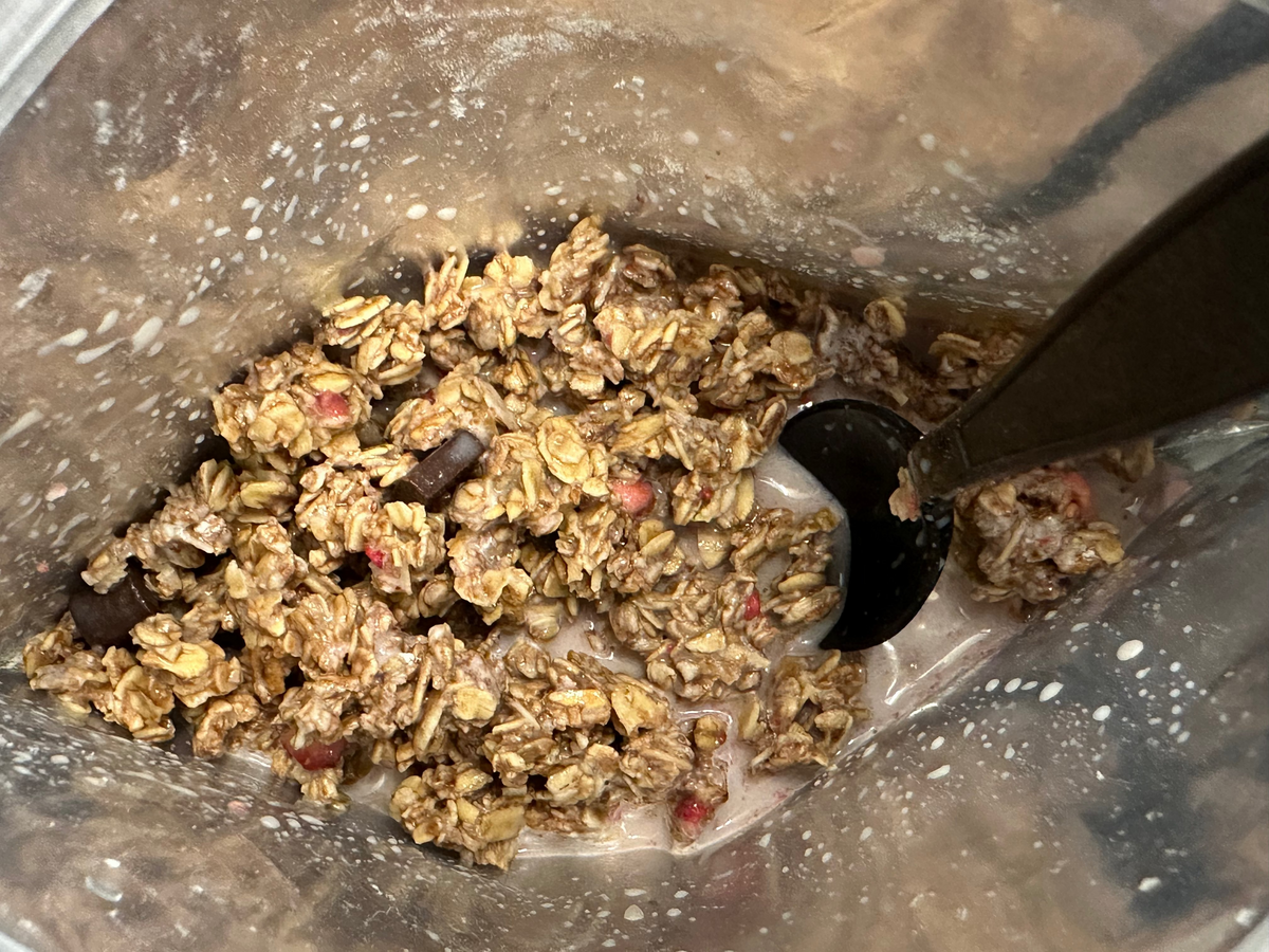 Dark chocolate berry granola from FOUNDATION Outdoors in a bowl, showing crunchy clusters with berries and chocolate chunks.