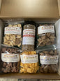 All-natural pet treat gift box from Artas'n Meats with assorted healthy treats for dogs.