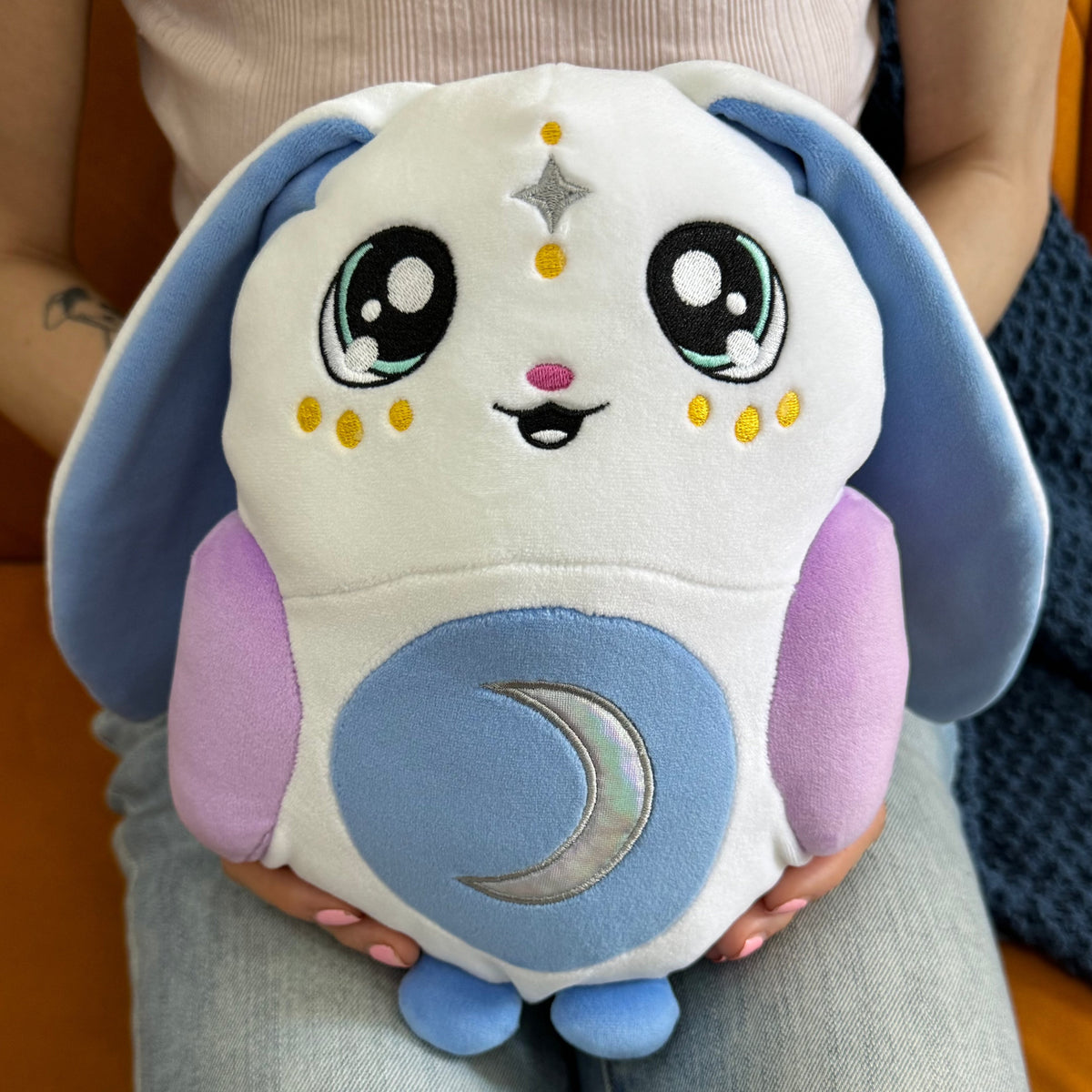 Soft Moon Pals 1.5lb Squish Plush Marshmallow toy with a cute, fluffy appearance and pastel colors for cuddling and play.