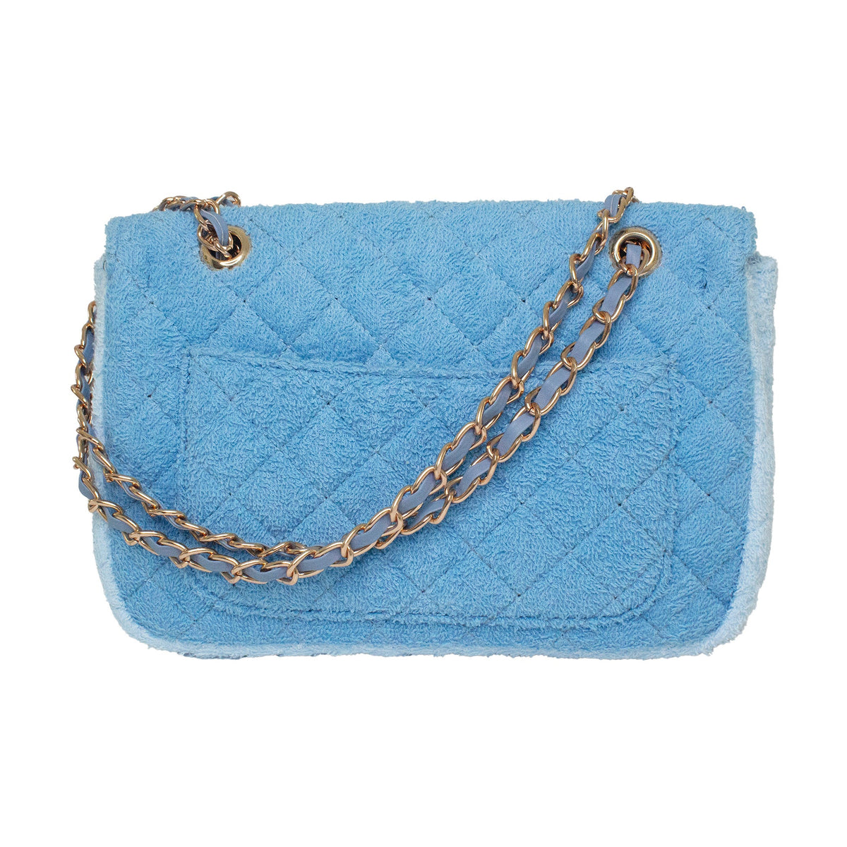 Small Shoreline Flap by BEACH HAUS in two-tone blue, shown on a model with the flap partially open.