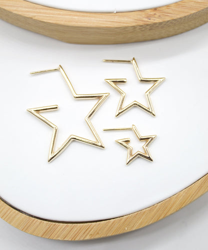 18K gold filled open star hoop earrings by MIA Jewelry, modern minimalist design with small star accents, perfect for everyday wear.