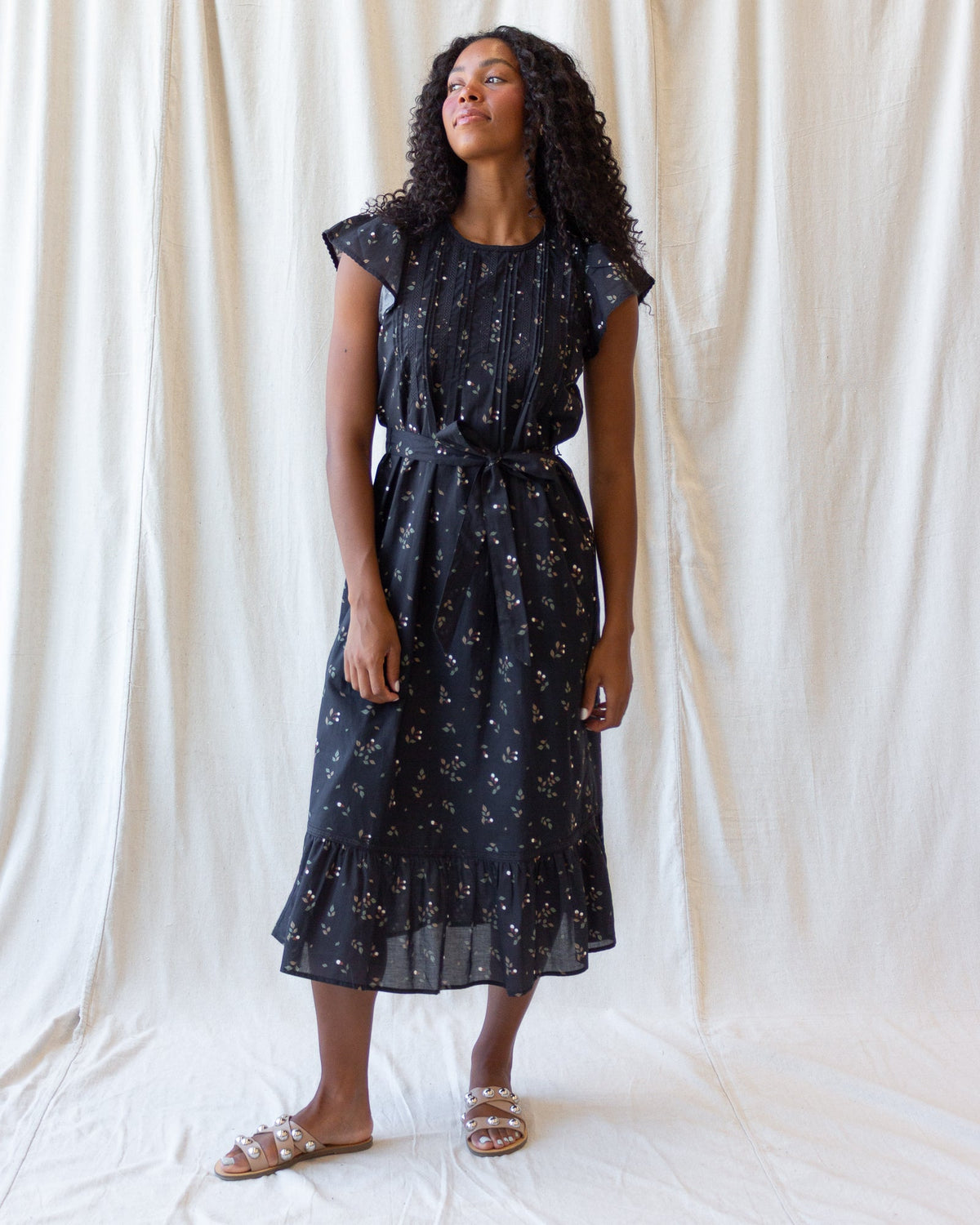 Downeast Pretty Pintuck Dress with a flowing fabric, delicate pintuck details, and a flattering silhouette.