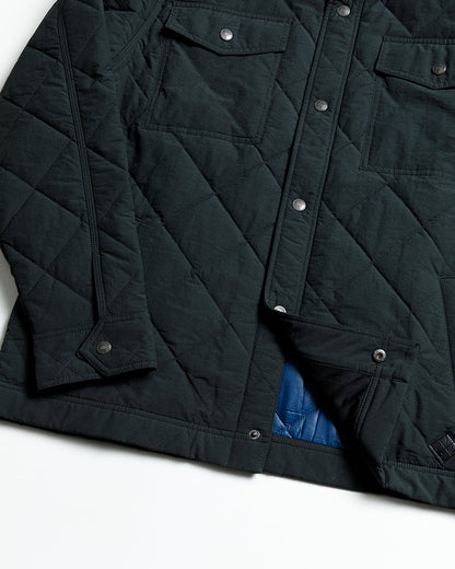 Vintage black Ignite quilted jacket by Off The Grid Surplus featuring a stylish, insulated design and quilted texture.