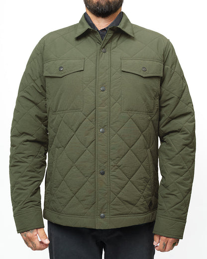 Dark olive Ignite quilted jacket by Off The Grid Surplus, featuring a padded design with a high collar and front zipper.