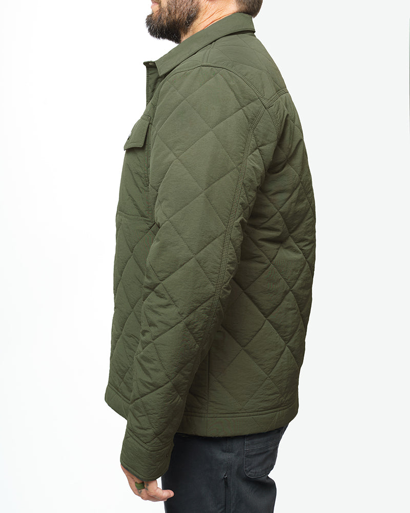 Dark olive Ignite quilted jacket by Off The Grid Surplus featuring a puffy design and front zipper closure.