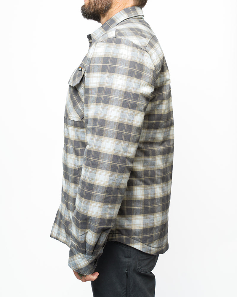 Off The Grid Surplus Ironside Flannel Castlerock jacket with button front and plaid pattern, displayed on a hanger.