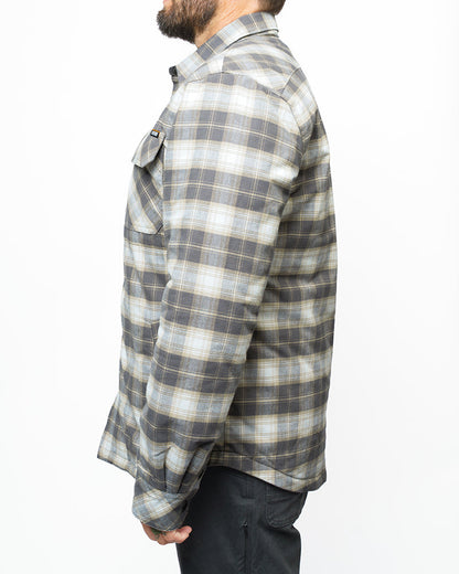 Off The Grid Surplus Ironside Flannel Castlerock jacket with button front and plaid pattern, displayed on a hanger.
