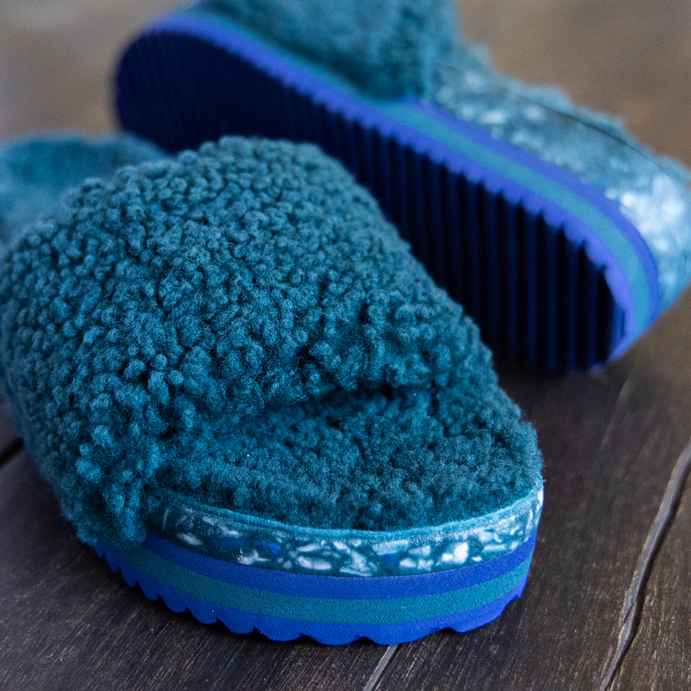 Fleks San Ysidro Slide in Jade, featuring a stylish slip-on design with a smooth jade-colored strap and cushioned footbed.