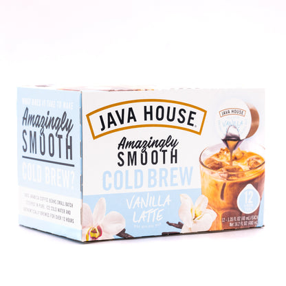 Cold brew latte with French vanilla flavor in a clear glass, topped with whipped cream and vanilla syrup from Java House.