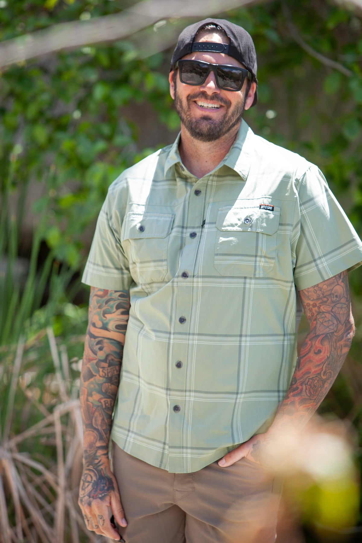 Sage green short sleeve Jack Knife SS shirt by Off The Grid Surplus, shown in a casual fit with button front and collar details.